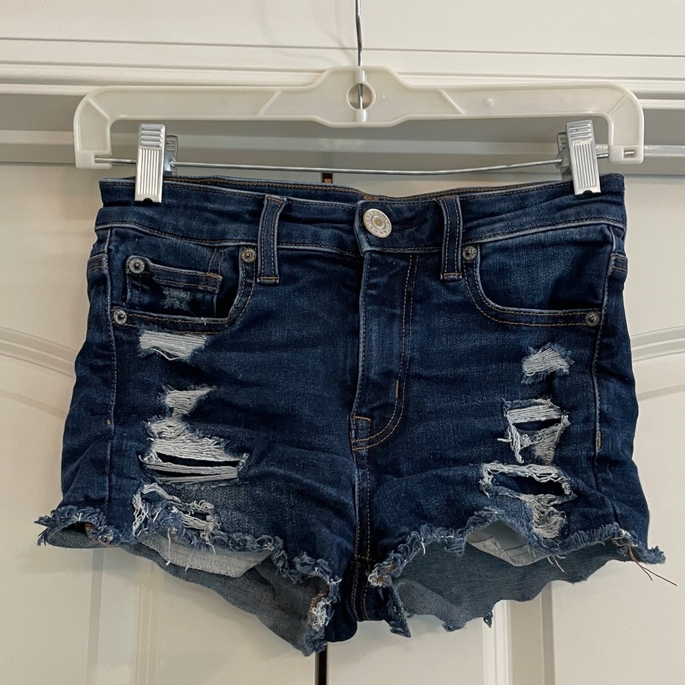 American Eagle hi-rise shortie shorts with rips.